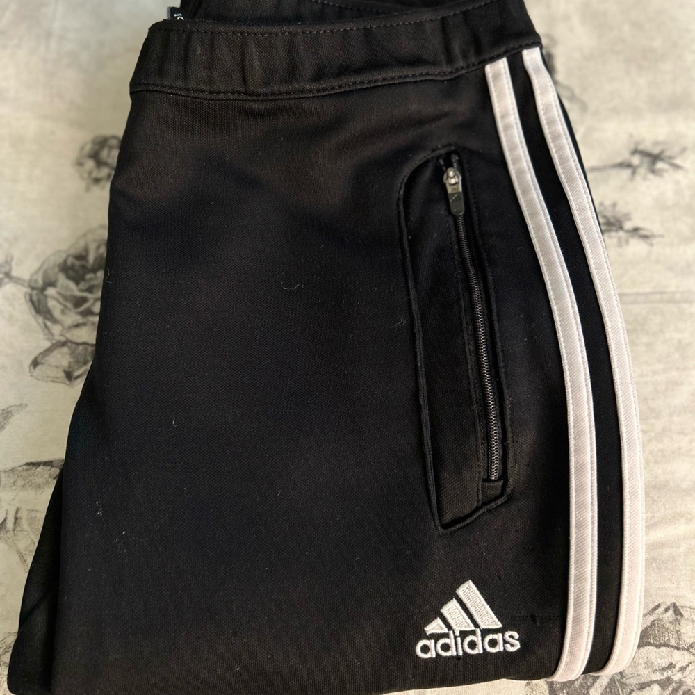 Adidas Black and White Sweatpants with Iconic Stripes